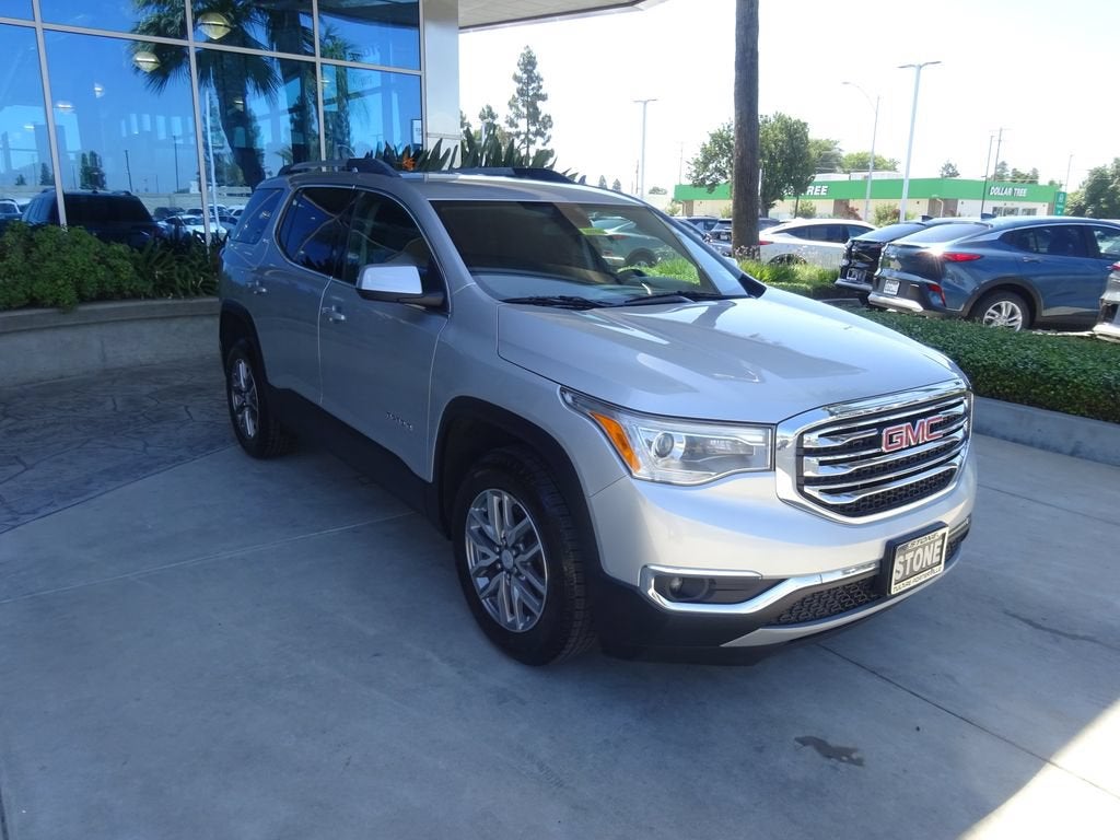 2019 GMC Acadia SLE in Quicksilver Metallic — front three-quarter view