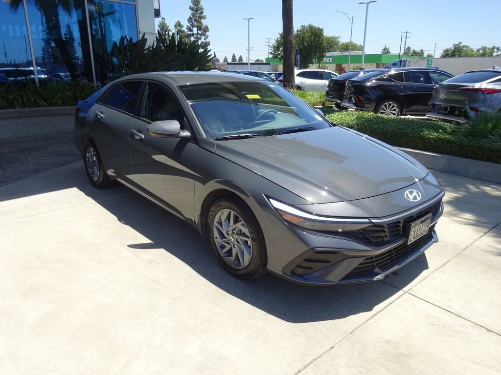 2025 Hyundai Elantra Hybrid Blue in Gray — front three-quarter view
